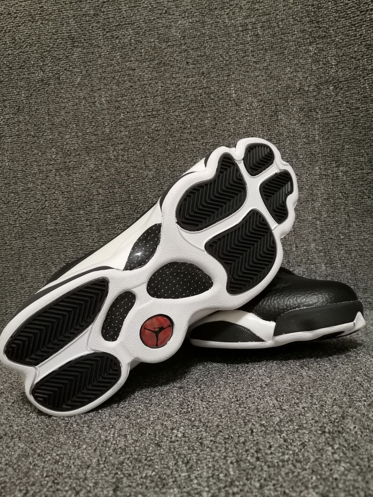Air Jordan 13 Retro Black Red White Sneakers - product image from the listing.