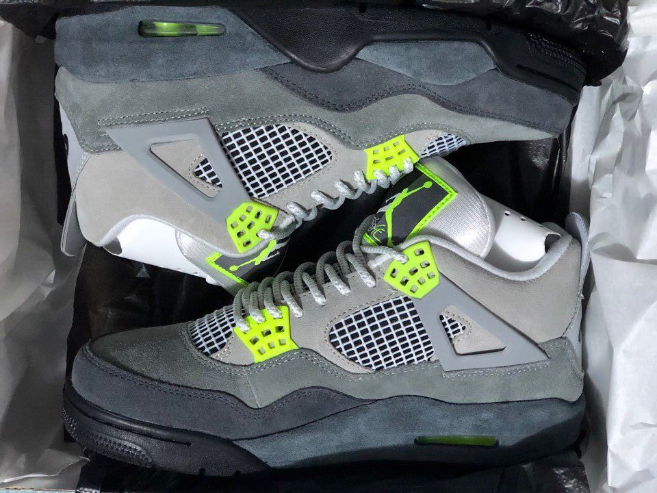 Jordan 4 Retro Sneakers in Gray Green - product image from the listing.