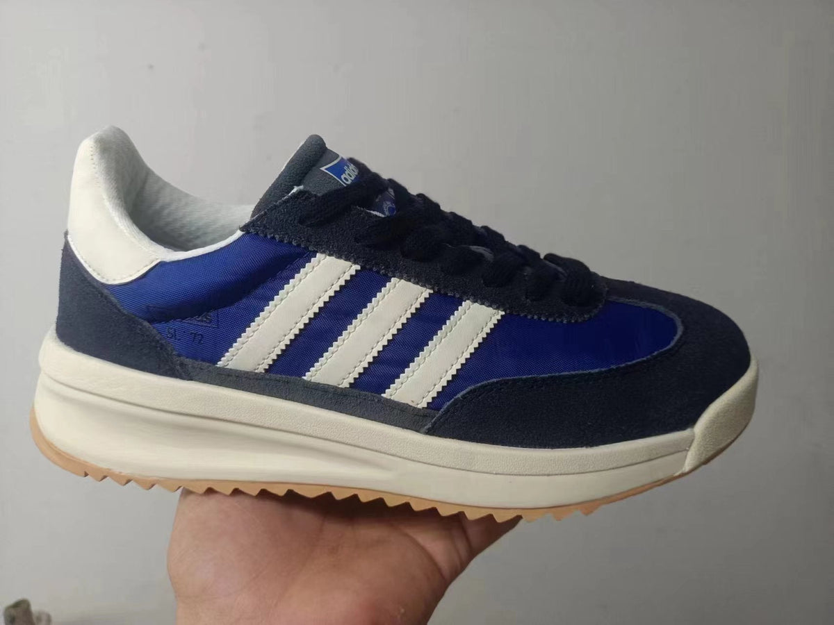 Adidas IH5560 Sneakers in Blue and White - product image from the listing.