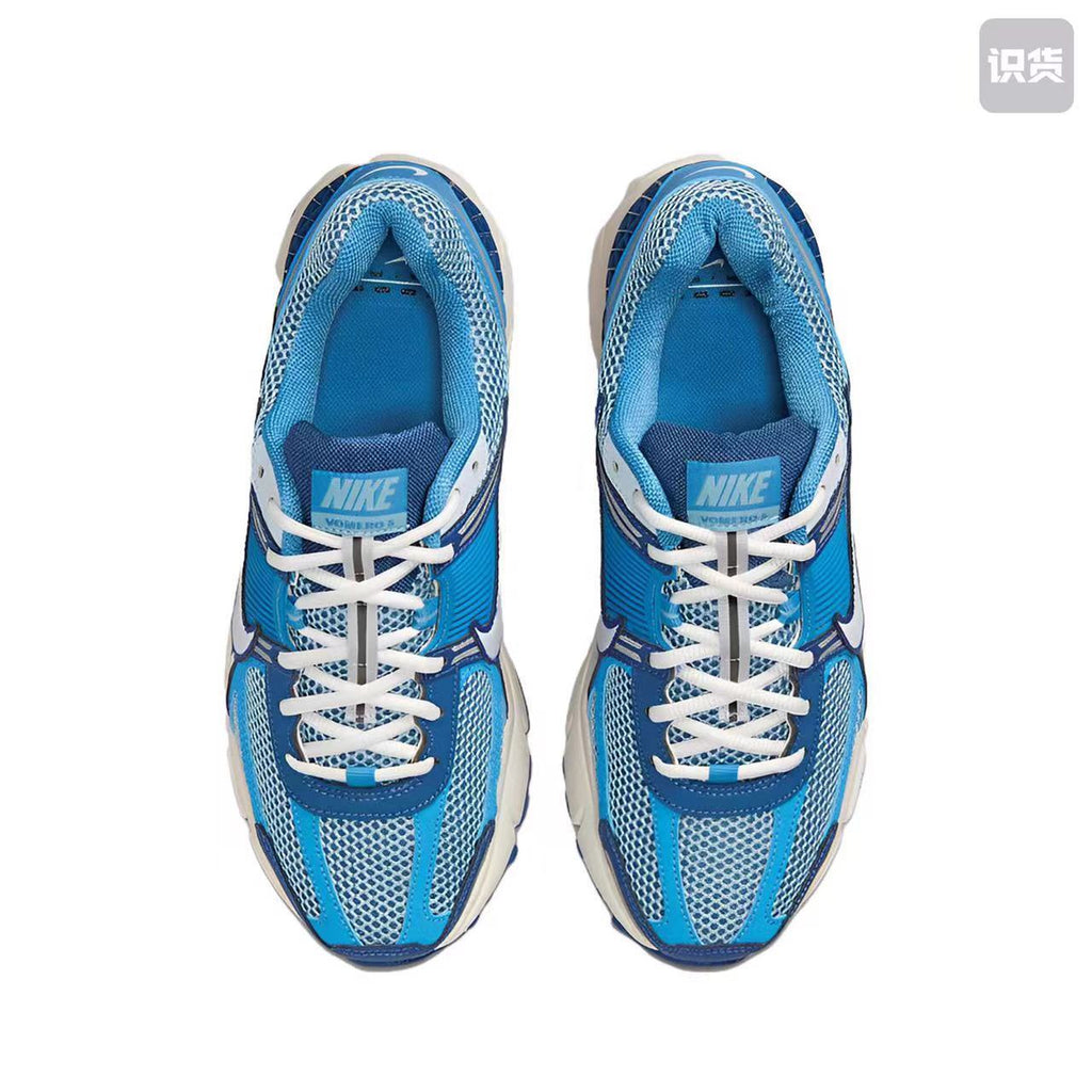 Nike Zoom Vomero 5 Sneakers in White Blue Silver - product image from the listing.