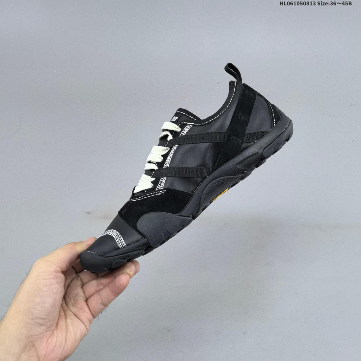 Black New Balance MT10O6NW Low-Profile Sneakers - product image from the listing.