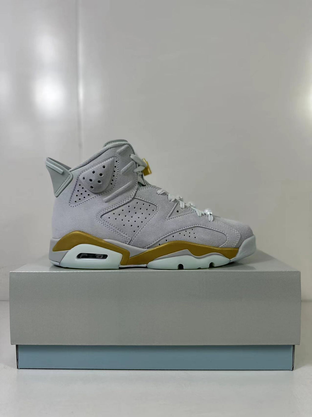 Air Jordan 6 High Sneakers White Gold Glacier Blue DQ4914-074 - product image from the listing.
