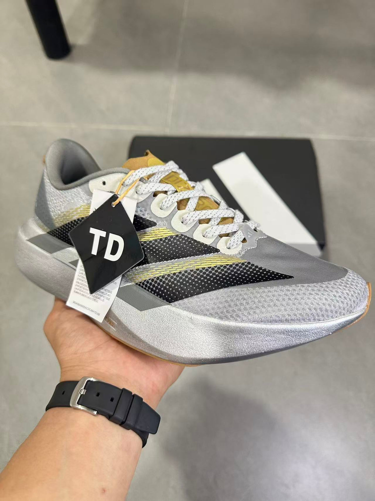 Adidas Adizero Evo SL Running Shoes in Silver Black KK4310 - product image from the listing.