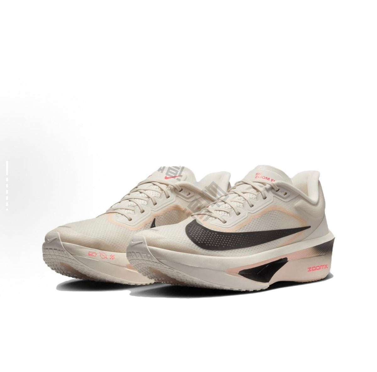 Light Beige and Black Nike ZoomX Running Shoes - product image from the listing.