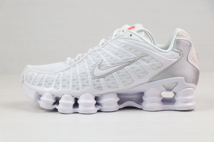 Black and Gold Nike Shox TL Sneakers - product image from the listing.
