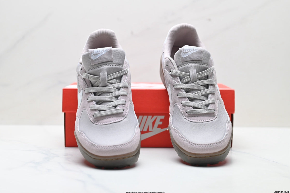 Light Gray and Pink Nike Terra Manta Sneakers - product image from the listing.