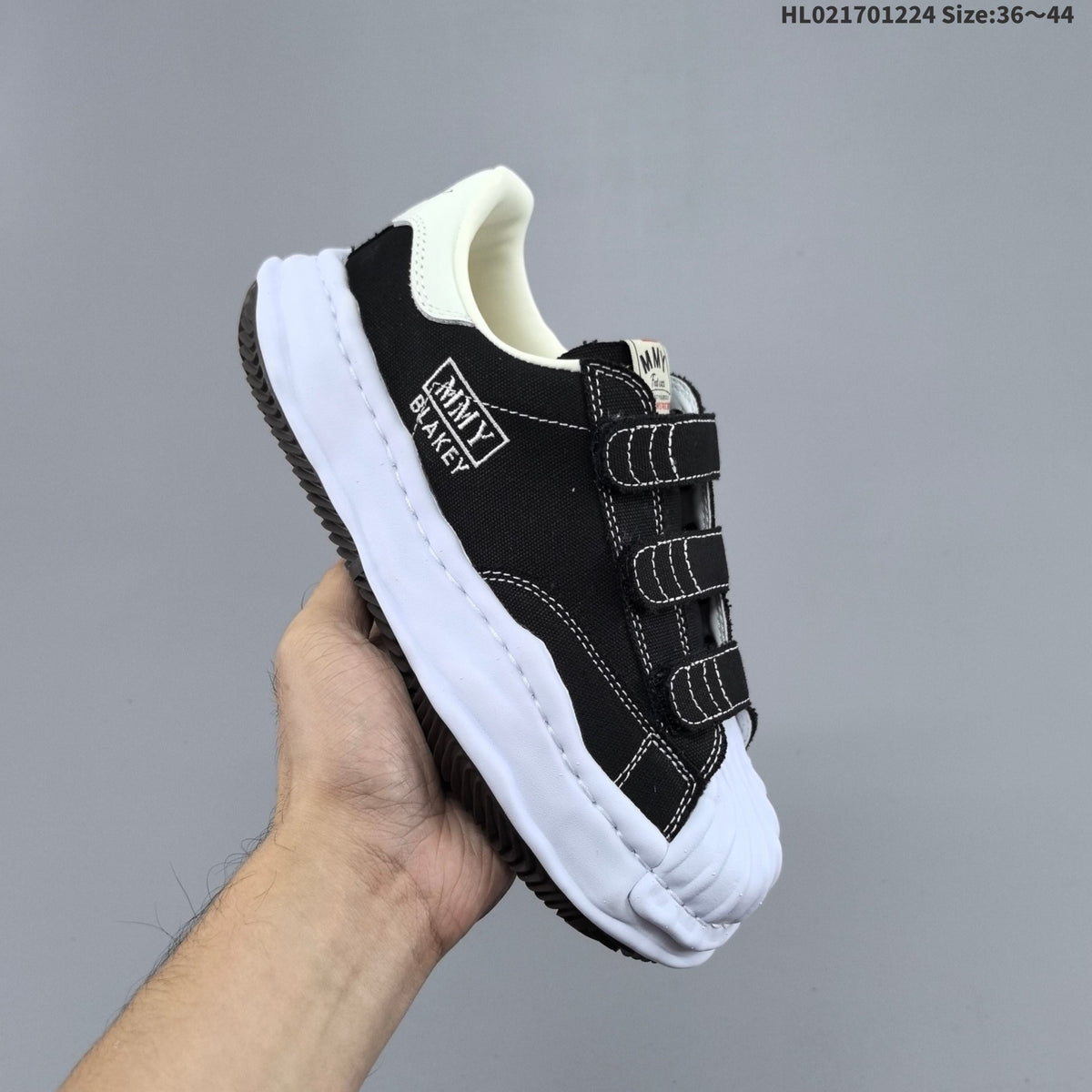 Maison MIHARA YASUHIRO Blakey Low Sneakers in Black White - product image from the listing.