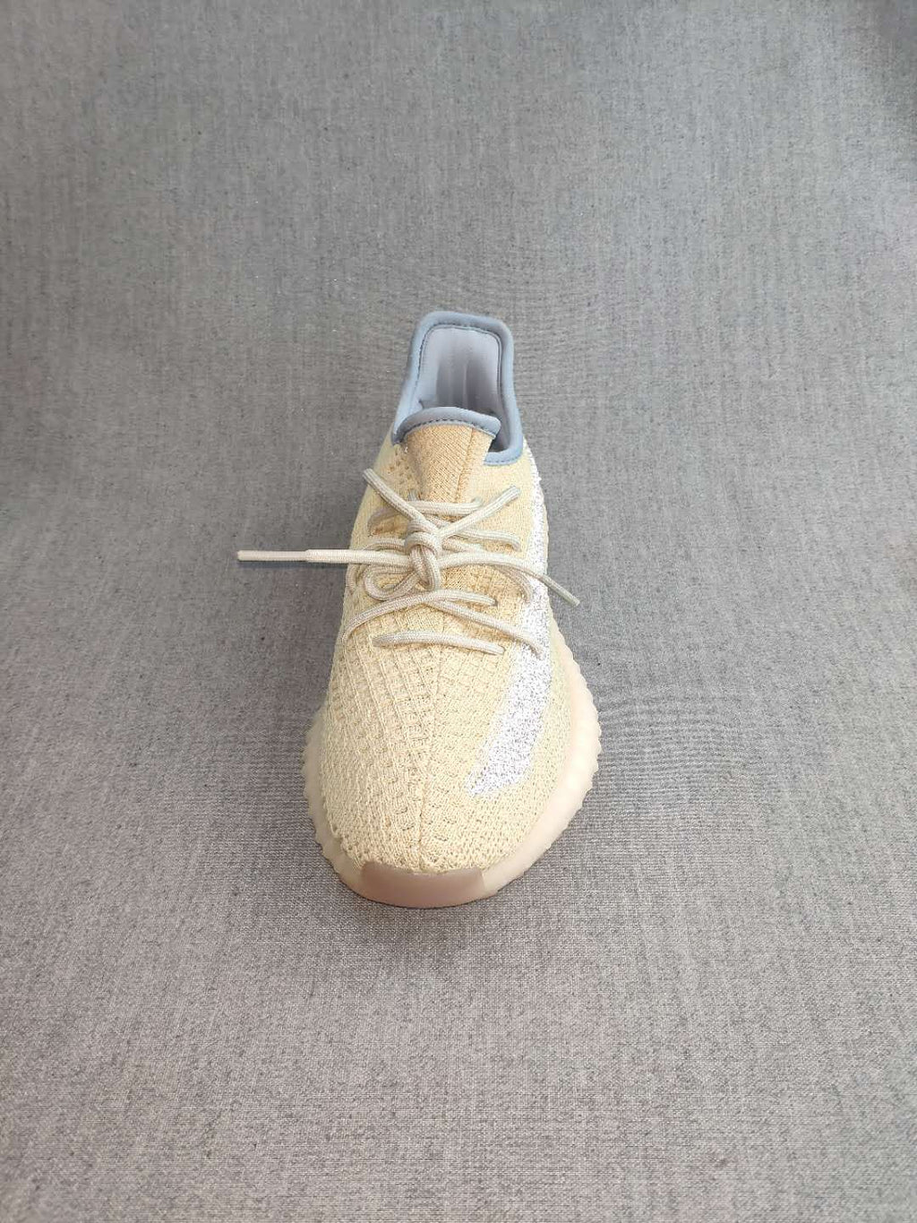 Beige Yeezy Boost 350 V2 Reflective Knit Sneakers - product image from the listing.