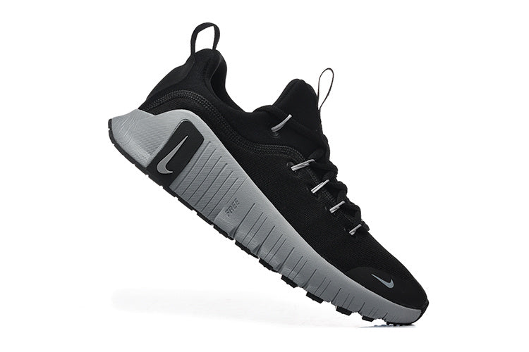 Nike Free Run Low-Top Sneakers in Black and Grey - product image from the listing.