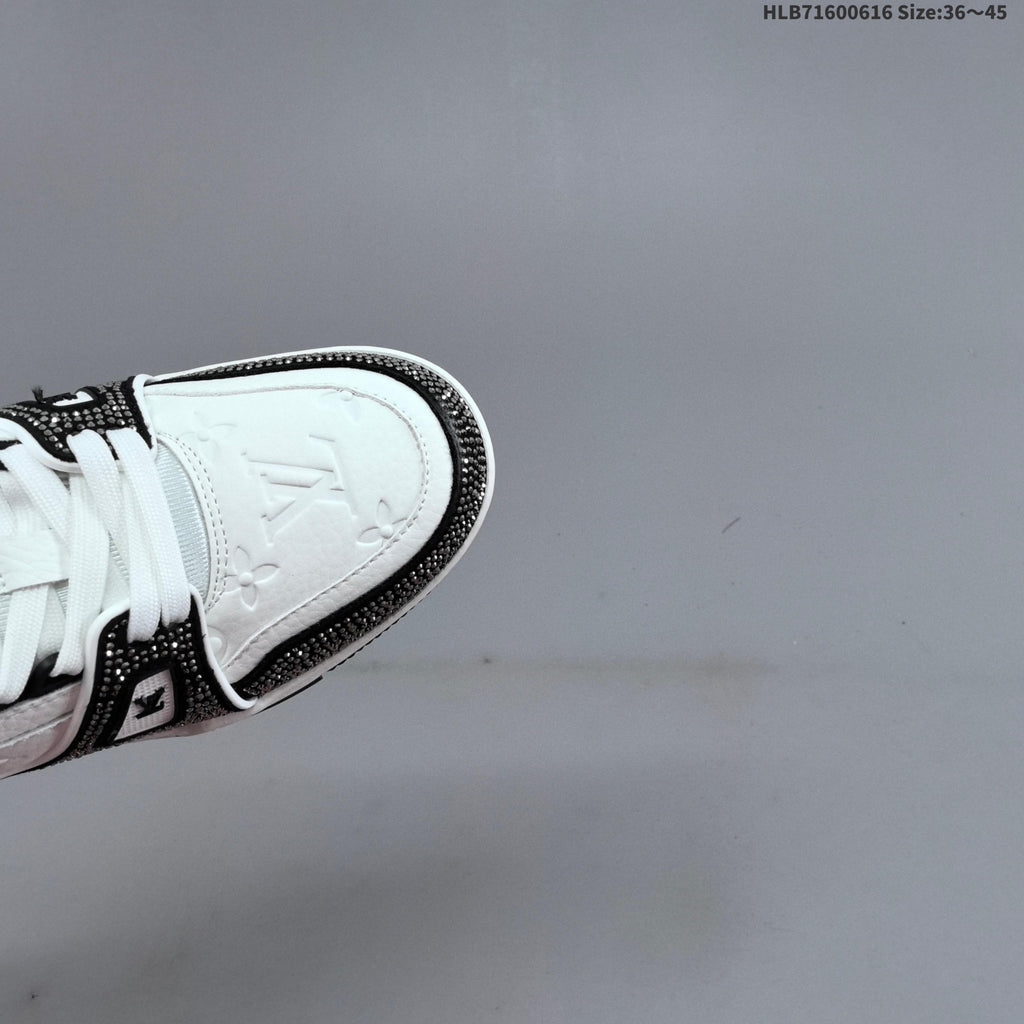 Louis Vuitton Trainer Trainers in White and Black with Embellished Trim - product image from the listing.