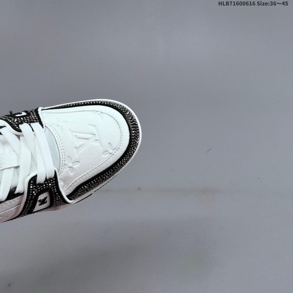 Louis Vuitton Trainer Trainers in White and Black with Embellished Trim - product image from the listing.