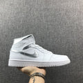 Air Jordan 1 Mid Sneakers in White Silver 554724-105 - product image from the listing.