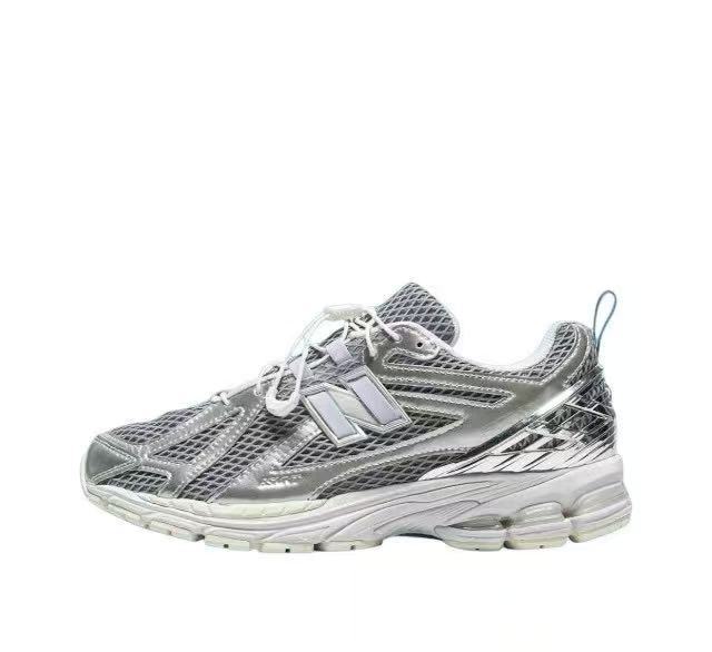 Silver and White New Balance 1906RBT Sneakers - product image from the listing.
