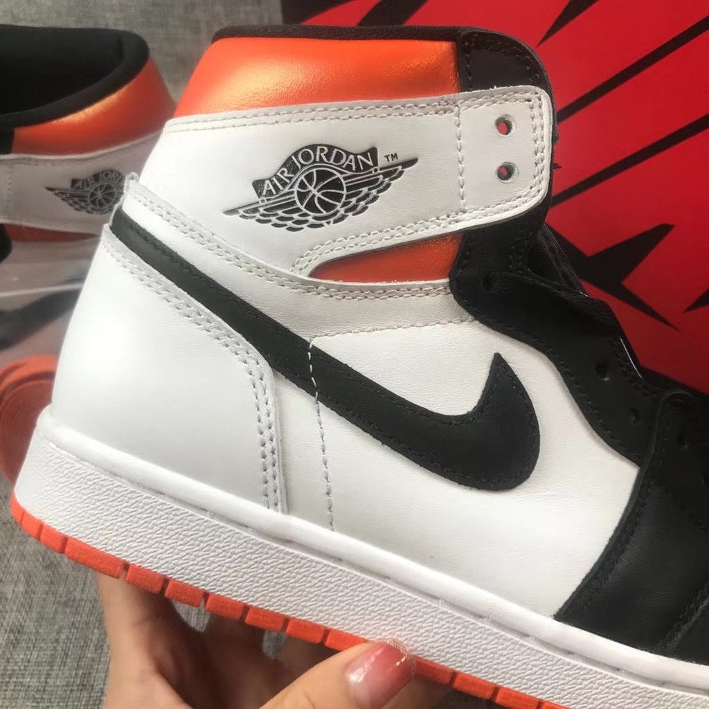 Jordan 1 Retro High OG Electro Sneakers in Orange - product image from the listing.