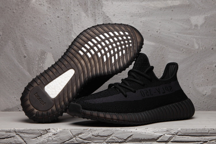 Yeezy 350 V2 Low-Top Sneakers in Black - product image from the listing.