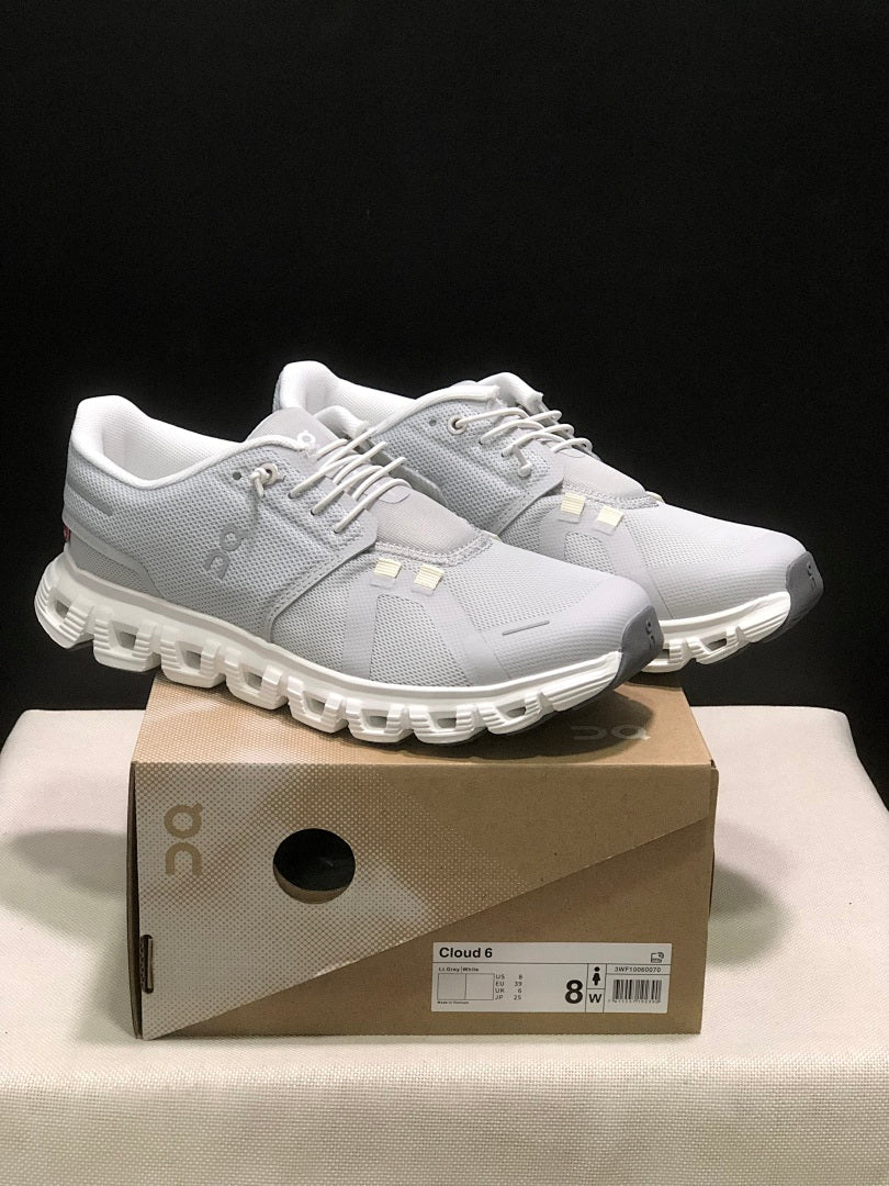 On Cloud 6 Sneakers in Gray and White - product image from the listing.
