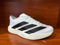 Adidas White Shoes for Running with Black Stripes - product image from the listing.