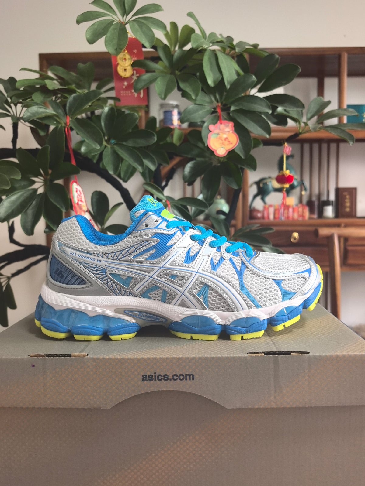 ASICS GEL-KINSEI 16 Running Shoes in White Blue - product image from the listing.