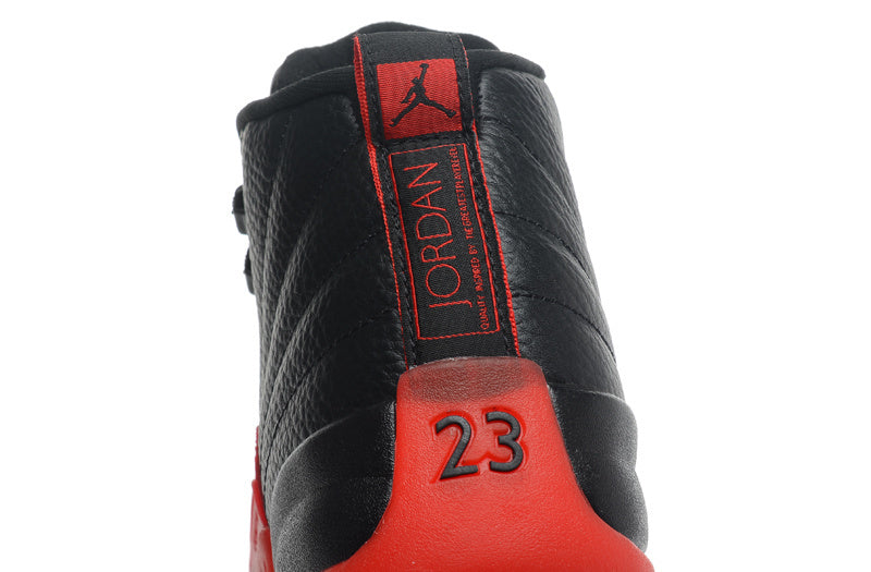 Air Jordan 12 Black and Red High-Cut Basketball Sneakers - product image from the listing.