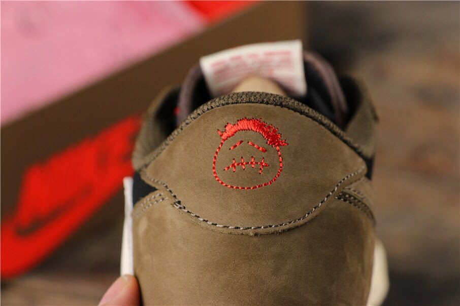 Dark Mocha Travis Scott Sneakers - Jordan 1 Low - product image from the listing.