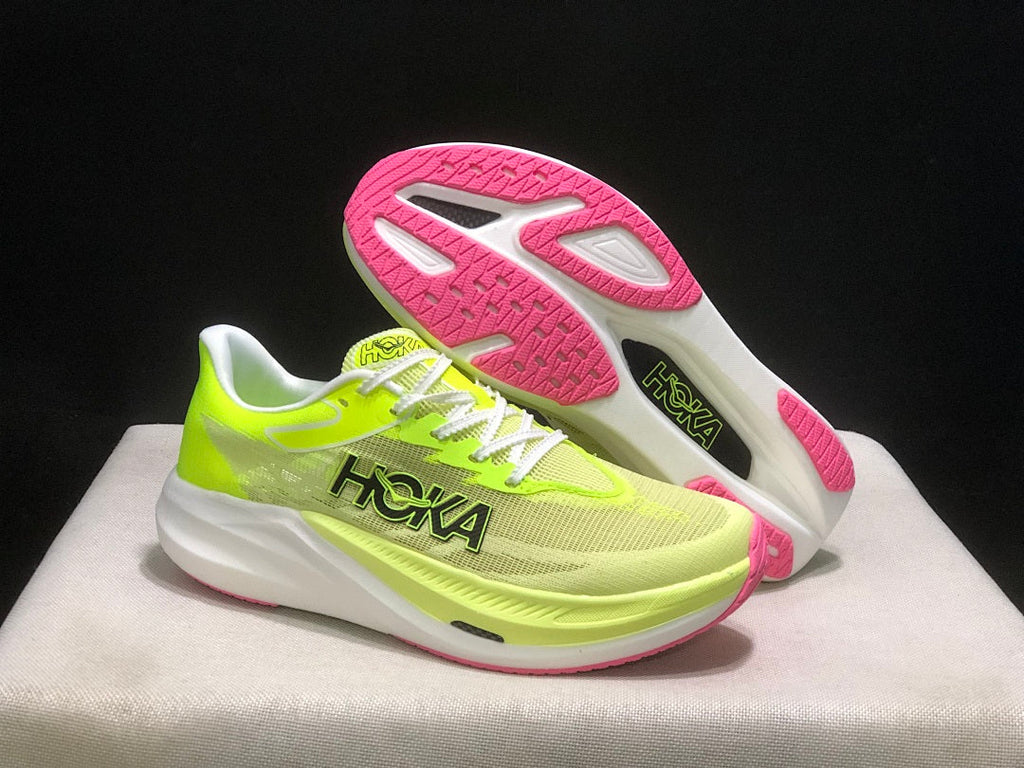 HOKA Rocket X 3 Running Shoes in Neon in Yellow and Pink - product image from the listing.