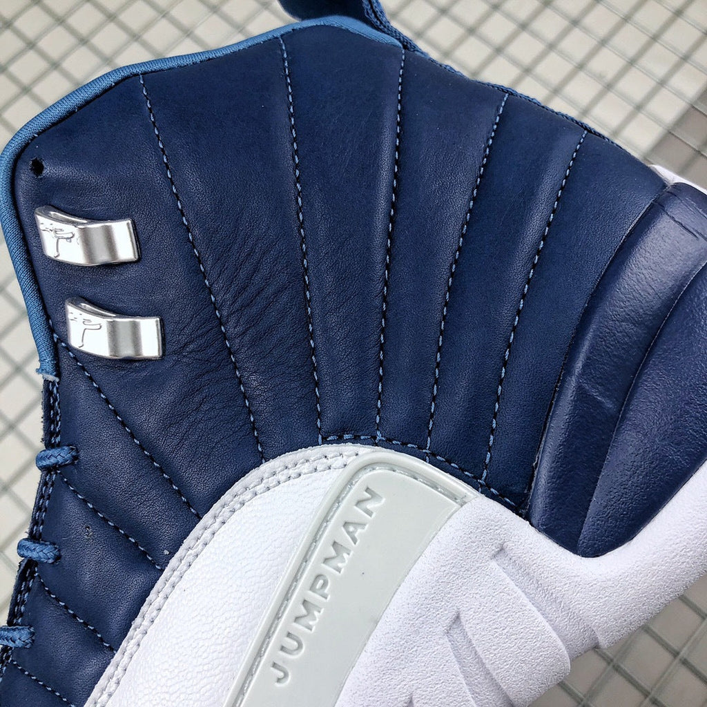 Air Jordan 12 Indigo Sneakers 130690-404 - product image from the listing.