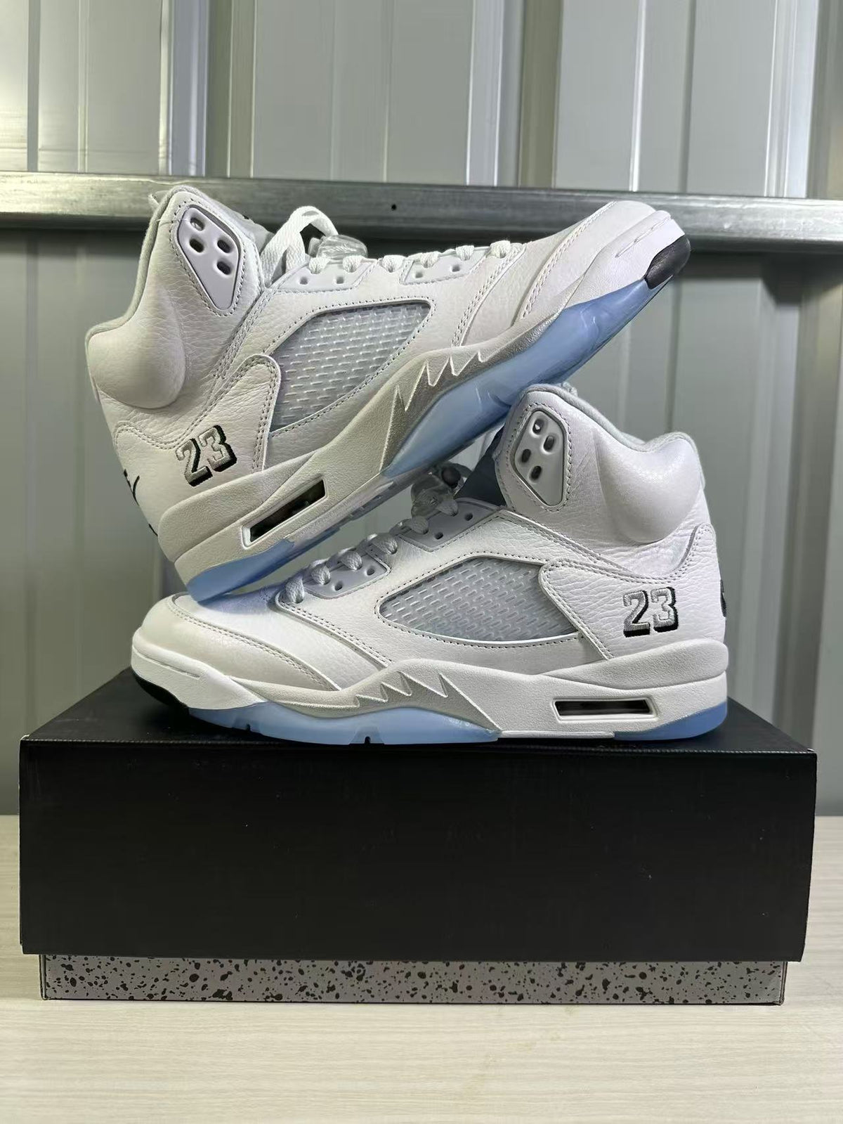 Air Jordan 5 Sneakers in White Silver HQ7978-103 - product image from the listing.