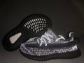 Black Yeezy 350 V2 Kids Sneakers - product image from the listing.
