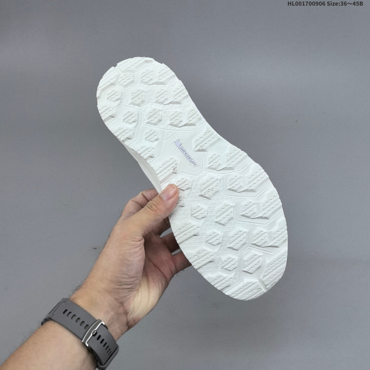 Descente Dualis Primer Slip-On Sneakers, in White and Black - product image from the listing.