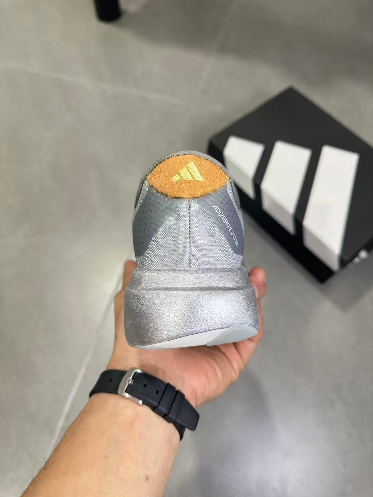 Adidas Adizero Evo SL Running Shoes in Silver Black KK4310 - product image from the listing.