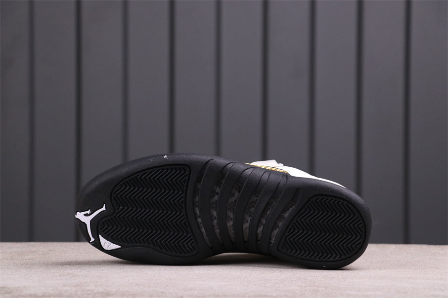 Air Jordan 12 Reverse Flu Game Sneakers White Black Gold - product image from the listing.