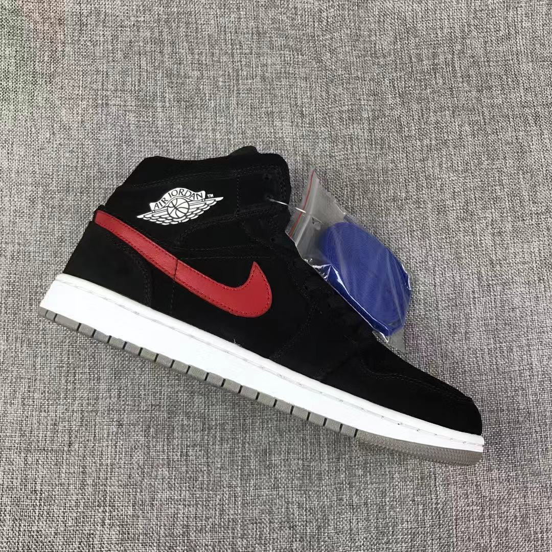 Jordan 1 Mid Sneakers in Black Red Blue 554724-065 - product image from the listing.