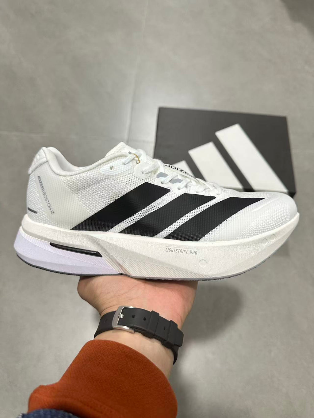 adidas Adizero Lightstrike Pro Running Shoes in White Black JS4939 - product image from the listing.