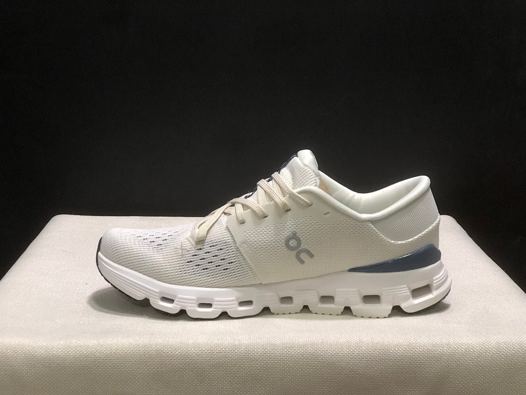 On Cloud X 4 Sneakers in Ivory and Blue - product image from the listing.