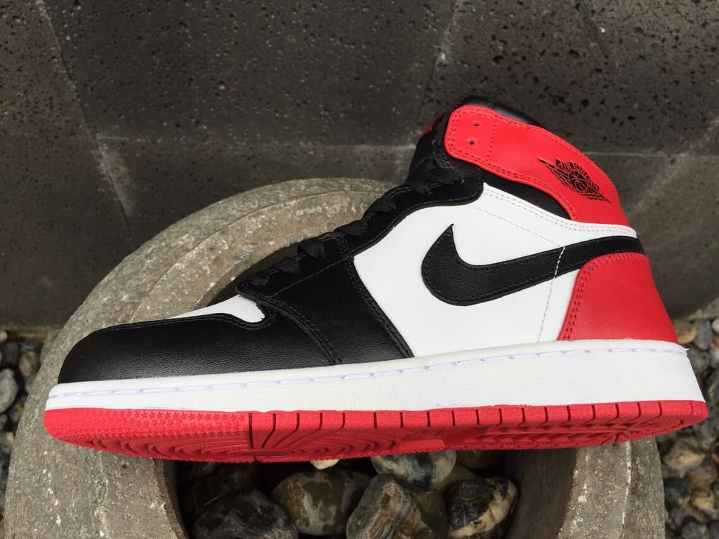 Jordan 1 High Sneakers in Black White Red - product image from the listing.