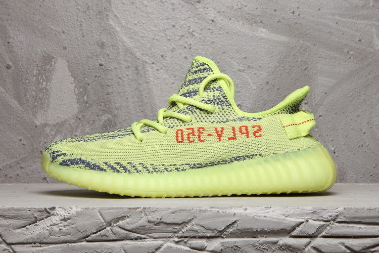 Lime Green and Charcoal Yeezy Boost 350 V2 Sneakers - product image from the listing.