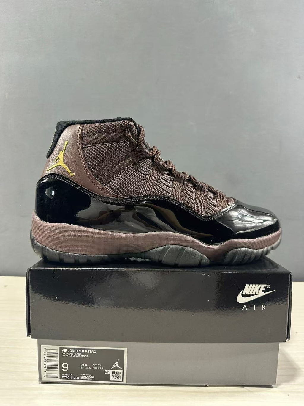 Air Jordan 11 Retro Black Bronze High-Top Sneakers - product image from the listing.