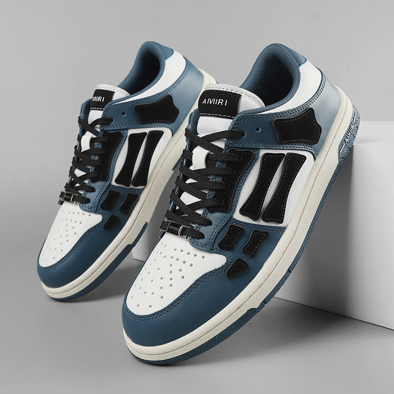 AMIRI Low-Top Sneakers in Navy, in White and Black - product image from the listing.