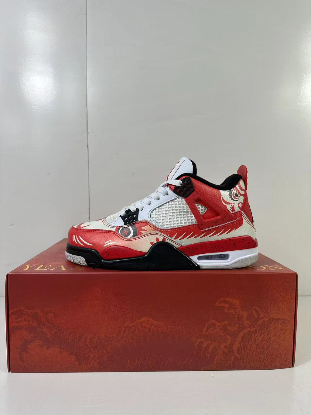Air Jordan 4 Chinese New Year Red Blue Sneakers DH6927-161 - product image from the listing.