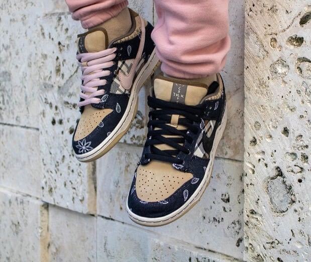 Black and Tan Jordan 1 High Paisley Pattern Sneakers - product image from the listing.