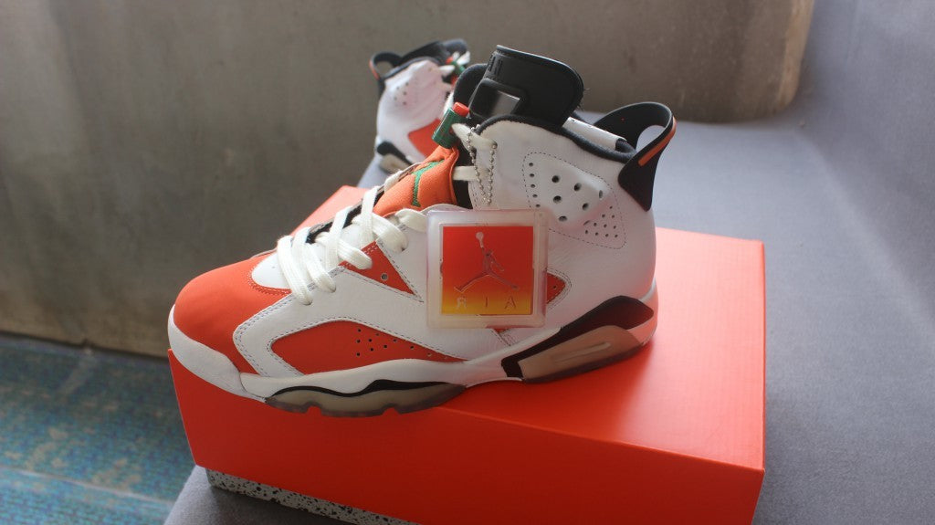 Air Jordan 6 Gatorade Basketball Sneakers in White Orange - product image from the listing.