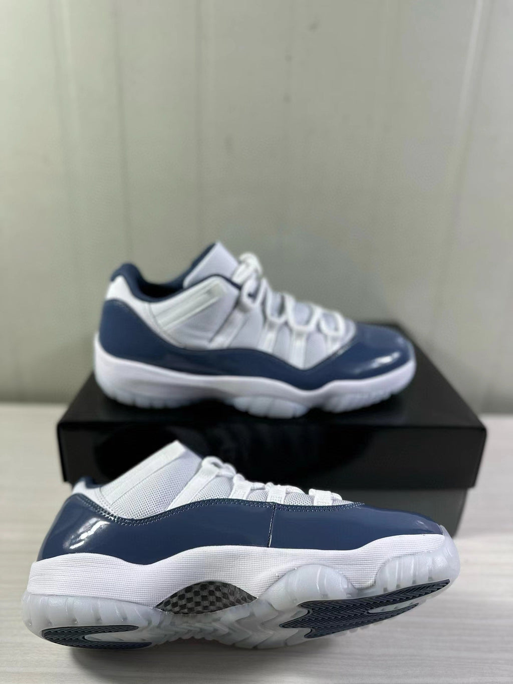 Air Jordan 11 Low Diffused Blue Sneakers FV5104-104 - product image from the listing.
