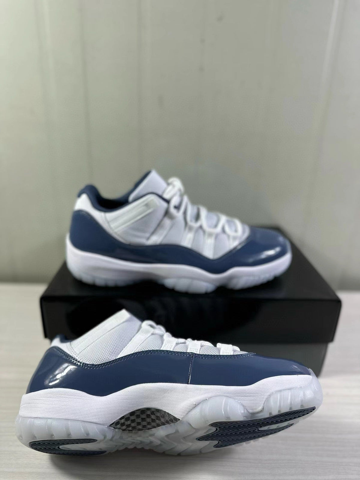 Air Jordan 11 Low Diffused Blue Sneakers FV5104-104 - product image from the listing.