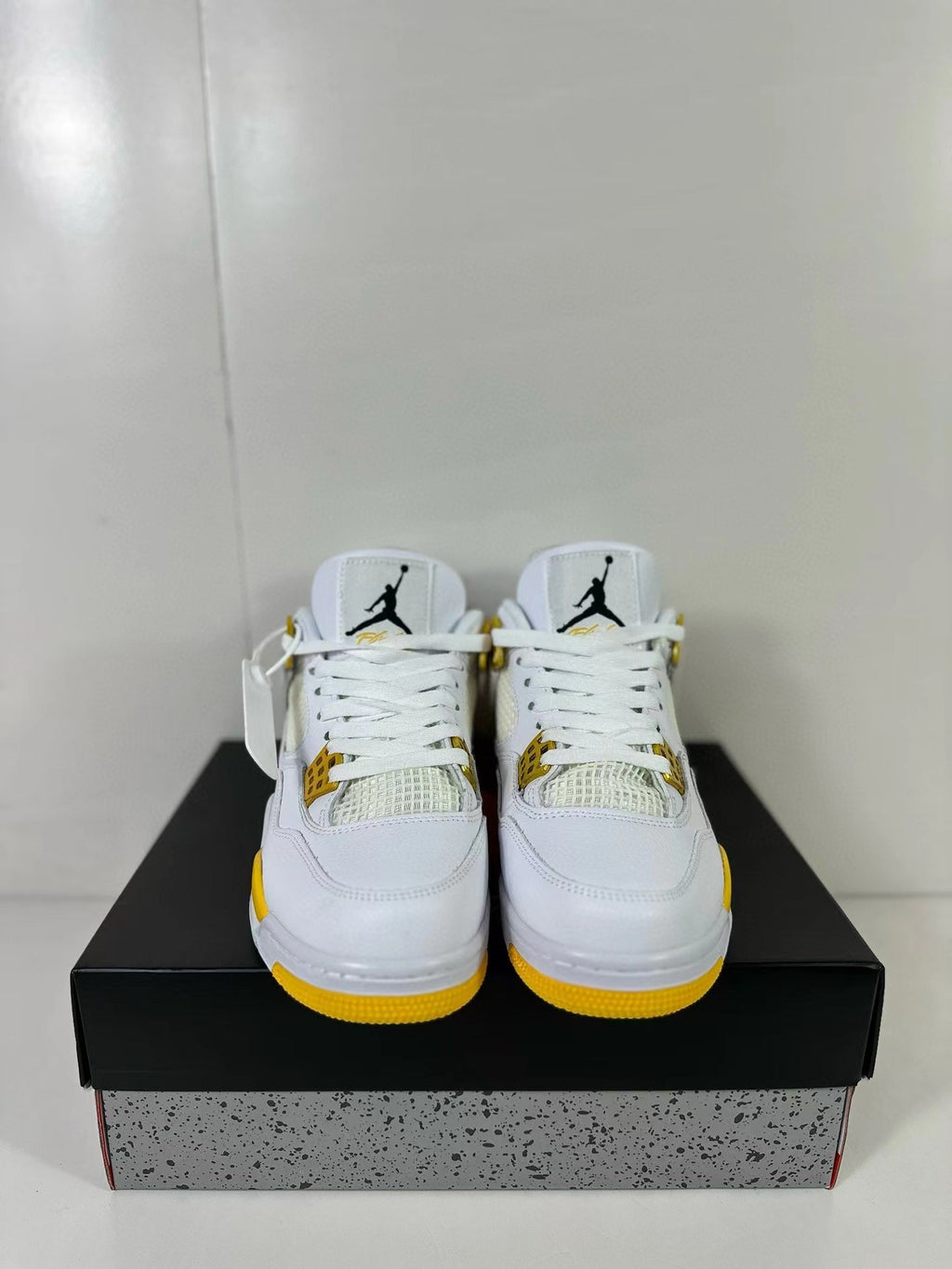Air Jordan 4 White Yellow Sneakers AQ9129-102 - product image from the listing.