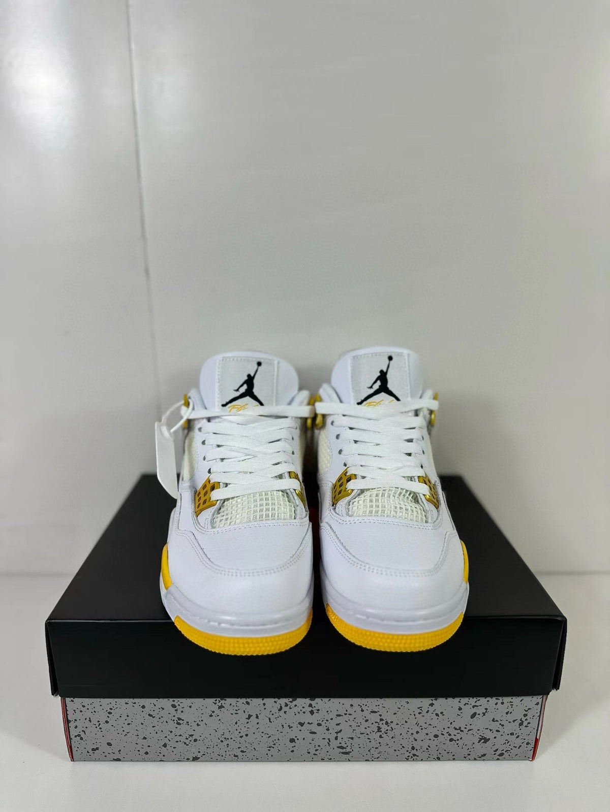 Air Jordan 4 White Yellow Sneakers AQ9129-102 - product image from the listing.