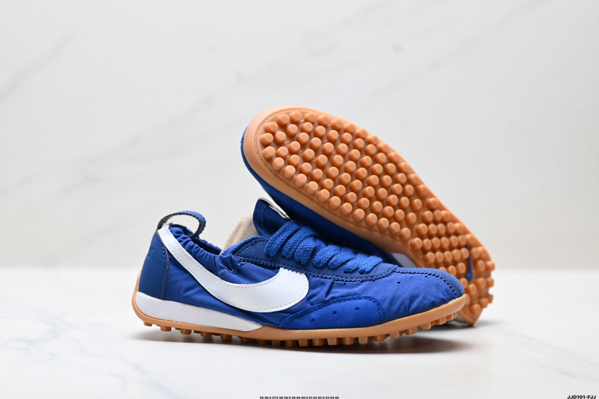 Jacquemus x Nike Jacumoon Low-Top Sneakers, in Blue and White - product image from the listing.