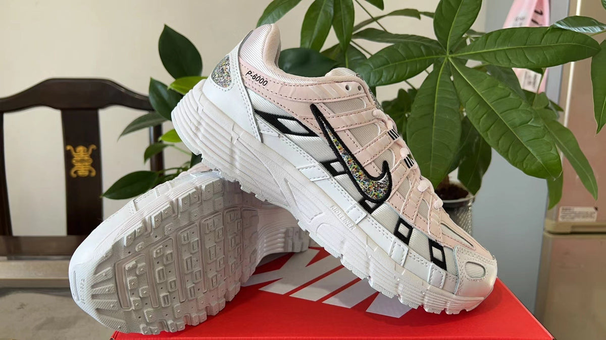Nike P-6000 Sneakers in White and Pink CJ9585-600 - product image from the listing.