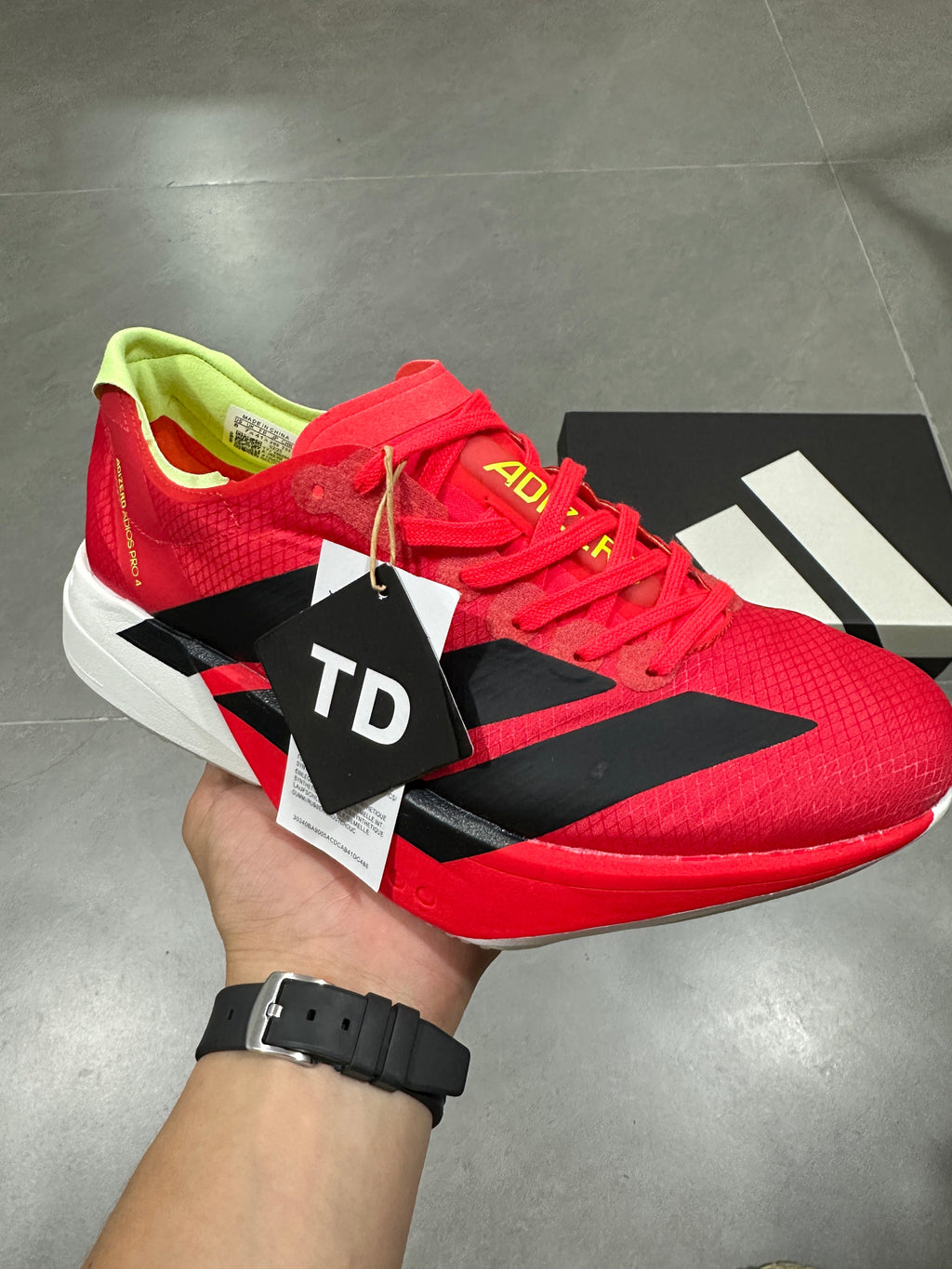 Nike Adizero Running Shoes in Red Black Volt JR6358 - product image from the listing.