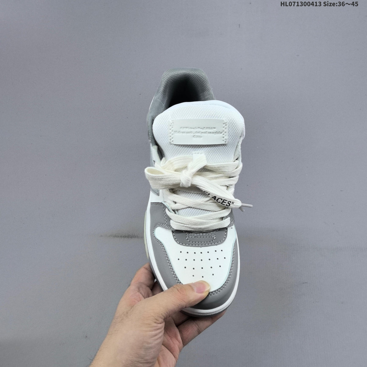 White and Grey Off-White Arrows Low-Top Sneakers - product image from the listing.