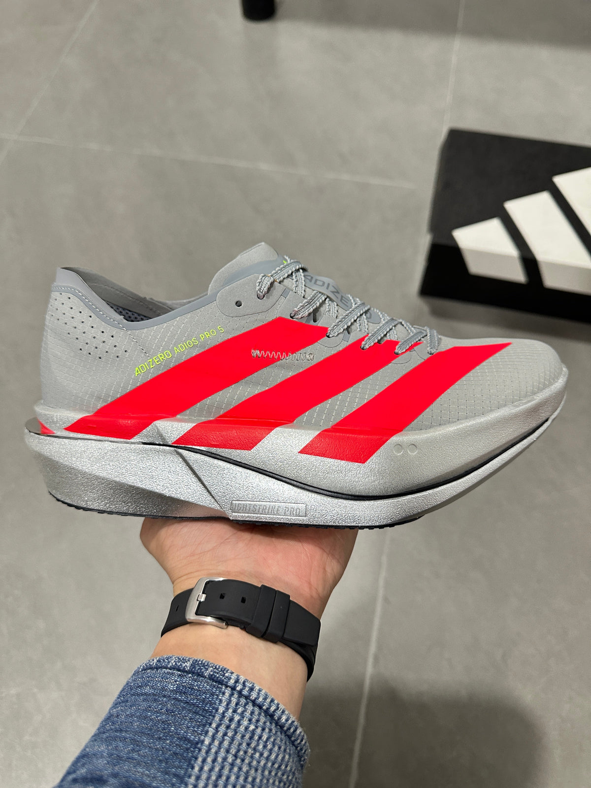 adidas Adizero Adios Pro 5 Running Shoes in Grey Red - product image from the listing.